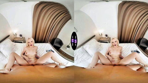 Nude blonde woman spreading legs exposing pussy on bed, amateur solo tease