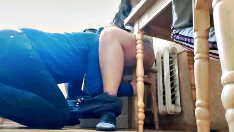 Brunette nurse in blue scrubs pulls down pants under kitchen table exposing big bare ass
