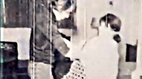 Vintage 1960s porn thumbnail: couple in intimate pose from Pussy Galore classic film