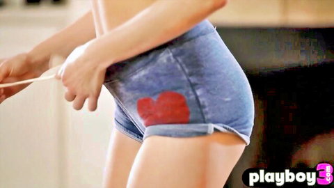 Petite Riley Reid in tight denim shorts with heart patch, teasing ass view