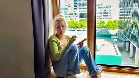 Lexi BTS Polish blonde model in casual green cardigan and jeans, BTS solo scene