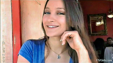 Sweet Dani smiling in blue top, ready to flash tits in public cafe