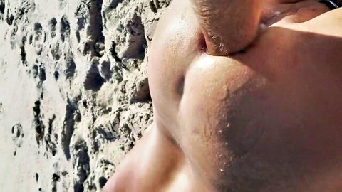 Muscular man anal fisting on Playalinda nude beach