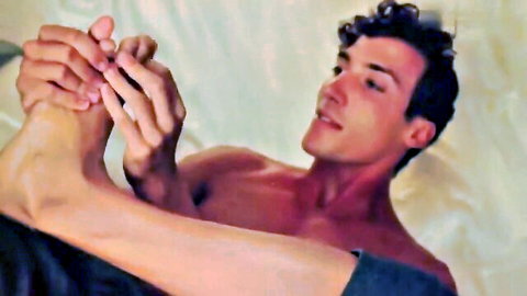 Xander and Danny in intimate foot play, man teasing woman's toes