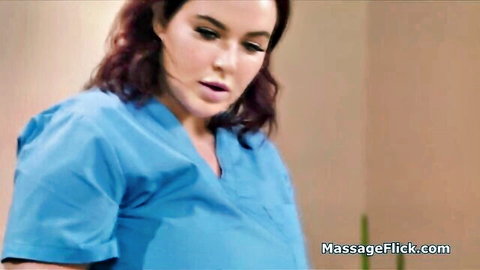 Curvy redhead masseuse in blue scrubs for oily breast play
