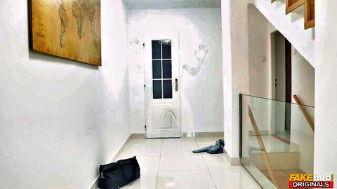 Empty bright hallway with world map poster, glass stairs, bag on floor in adult video scene
