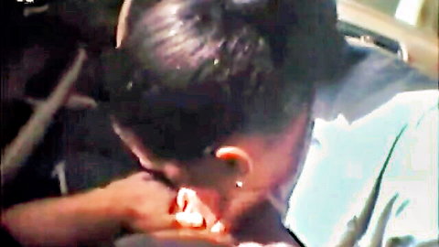 Intense car blowjob scene from Street Blowjobs with dark-haired performer