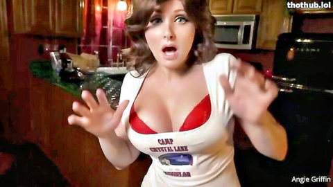 Busty cosplay babe in Camp Crystal Lake shirt flashes red bra and huge tits cleavage scared in kitchen