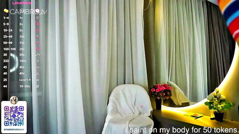 Odelia Brownell teases body painting in pale naked Chaturbate solo show
