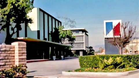 Vintage building exterior with red blue logo, Carol Connors adult video thumbnail