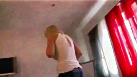 Blonde MILF teases her tight ass in low-rise jeans and backless tank top from behind POV