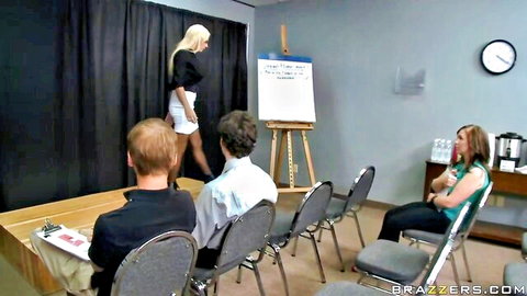 Lylith Lavey blonde bombshell in short skirt tease on Brazzers stage