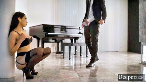 Vicki Chase in black lingerie and stockings seduces her man