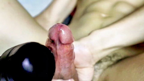 Close-up penis handjob massage with thick semen ejaculation spray