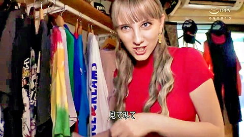 Blonde Melody Marks in red top, smiling seductively in JAV wardrobe scene