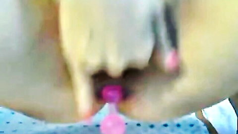 Cute Asian teen solo closeup with pink toy insertion