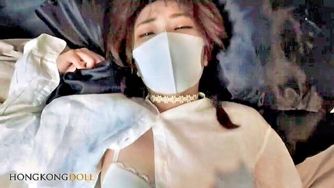 Hong Kong Doll in mask and sheer white blouse lingerie tease