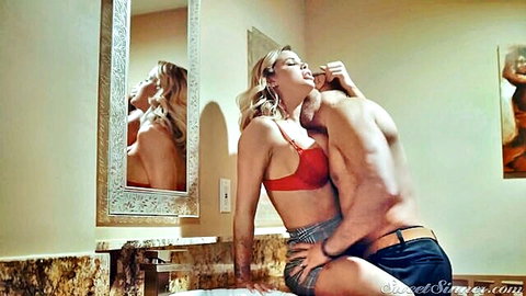 Jessa Rhodes in red bra and skirt kissing muscular man intimately