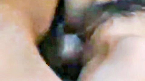 Blurry close-up of Japanese teen couple in intimate bedroom sex