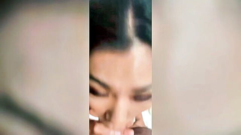 Close-up of curvy Asian teen giving intense blowjob