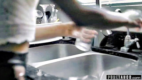 Emily Willis bending over kitchen sink in white crop top and shorts, stepdad behind her in Pure Taboo taboo scene