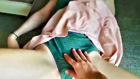 Horny girl in pink skirt and green panties touched intimately by hand