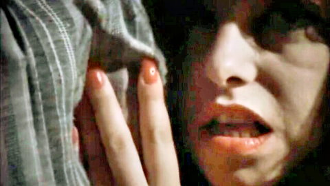 Lina Romay intense open-mouth expression in erotic close-up scene