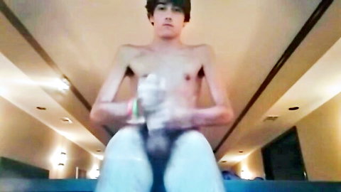 Skinny white twink with hairy bush and armpits strokes his cock solo