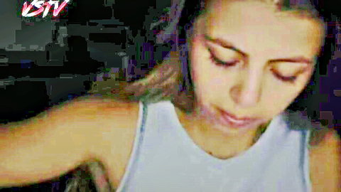 Victoria Smith close-up, eyes down, white tank top, teasing blowjob vibe