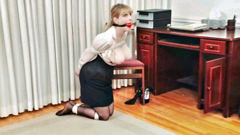 Bound blonde secretary gagged in stockings, office BDSM tease