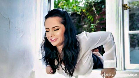 Crystal Rush in seductive white blouse leaning out window, naughty sister tease