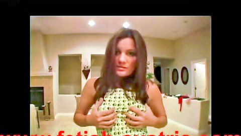 Brunette Latina femdom teases in revealing green polka-dot dress POV