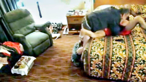 Dominant man in doggy style with submissive woman, gagging her