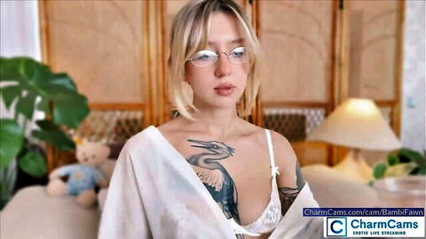 Bambi Fawn blonde in open white lingerie with dragon tattoo tease