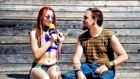 Alesya redhead with dreads seduces in outdoor tease with bearded man