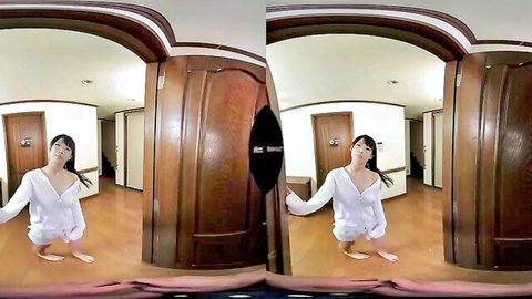 Japanese woman in white blouse and shorts kneels seductively in POV VR tease