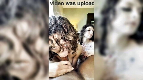 Gothcourt and curvy roomie topless, giving blowjob to curly-haired guy in amateur threesome