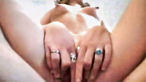 Blonde babe's shaved pink pussy spread wide open by hands with wedding rings