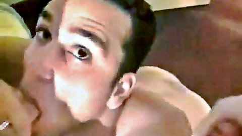Muscular gay dude with intense eyes deepthroats thick cock in close-up amateur blowjob