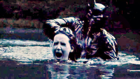 Julie Anne Prescott topless screaming in Bloody Summer Camp horror water attack
