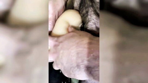 Close-up hand penetrating tight fleshy object, adult explicit scene