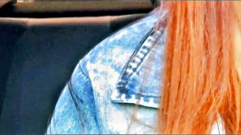 Red-haired Latina driver in denim jacket, seductive car ride tease