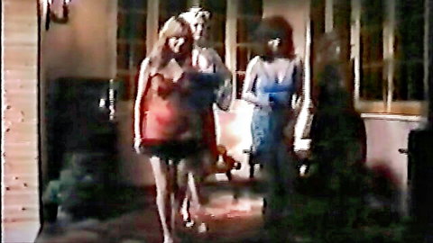 Retro blonde and ebony in sexy red and blue dresses from Sesso Allegro