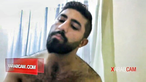 Hassim, bearded Syrian Arab gay man shirtless in shower