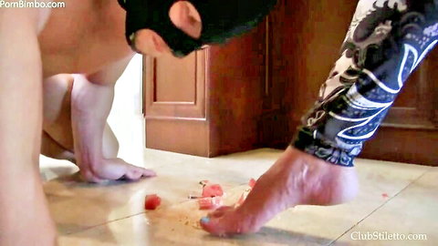 Mistress Kandy crushes watermelon under bare feet for slave to eat