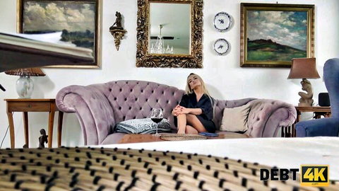 Blonde skinny babe in open silk robe teasing small tits on velvet sofa with wine glass