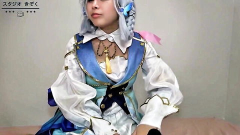 Kamisato Ayaka cosplay beauty in blue elegant dress posing solo