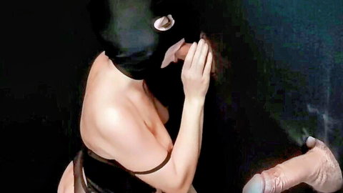 MILF in mask sucking stranger's cock at gloryhole, topless glory hole fetish