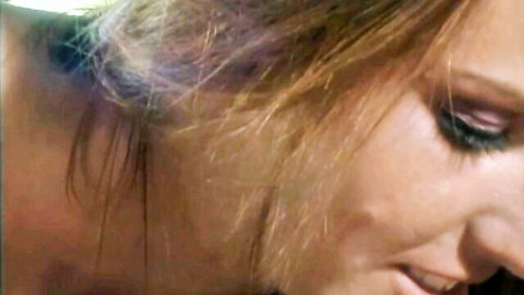 Nicole Sheridan close-up smile in outdoor lesbian sex scene