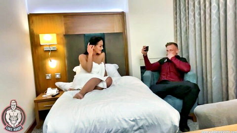 Brunette Zuzu in white towel on bed, teasing before doggy style passion